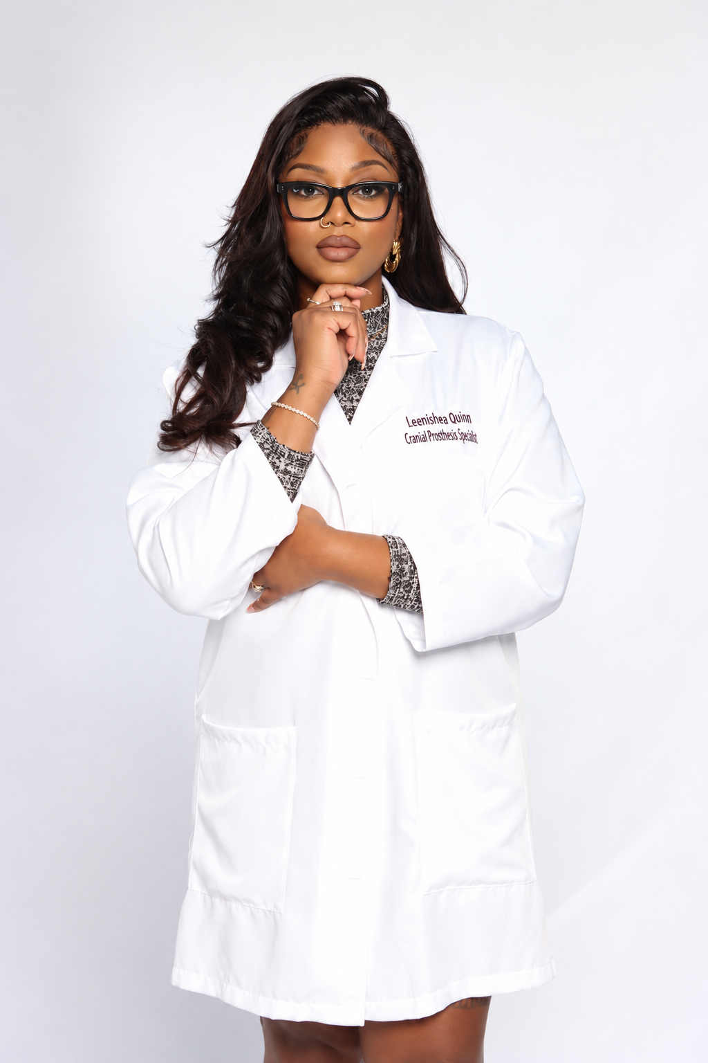 Leenishea C. Quinn, Cranial Prosthesis Specialist, wearing a white lab coat